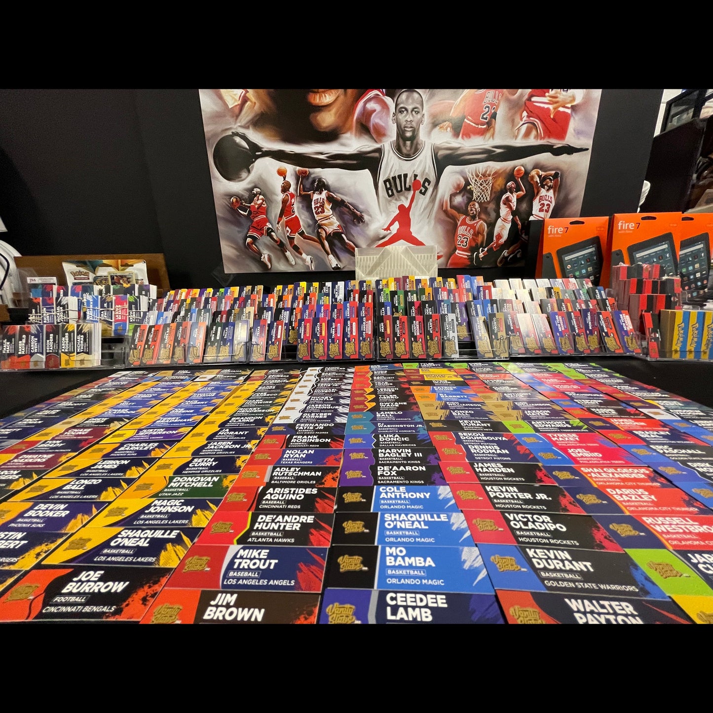 Rows of sports trading cards with sport horizontal label backgrounds for vanity slabs