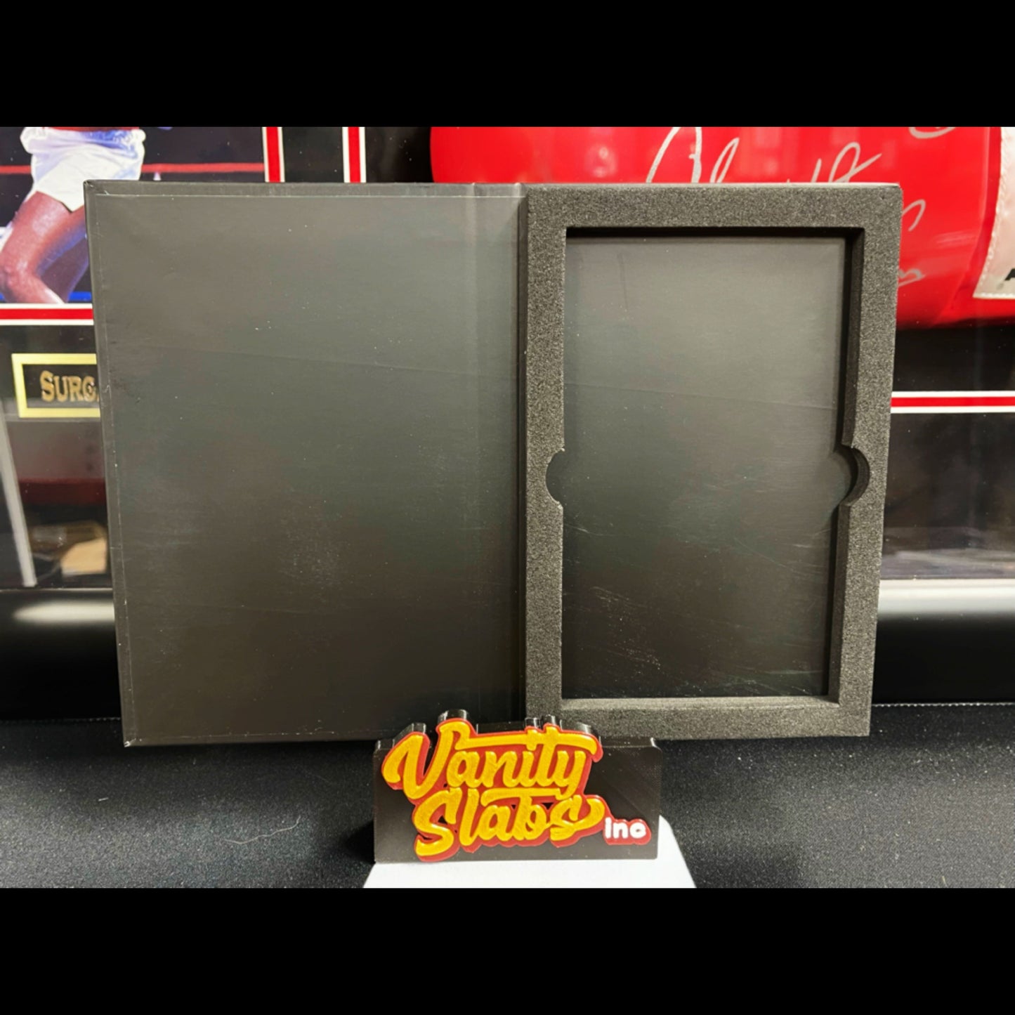 Open black slab mailer with foam insert for hockey basketball cards and slab book case
